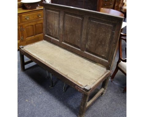 An oak settle, three panel back, circa 1800