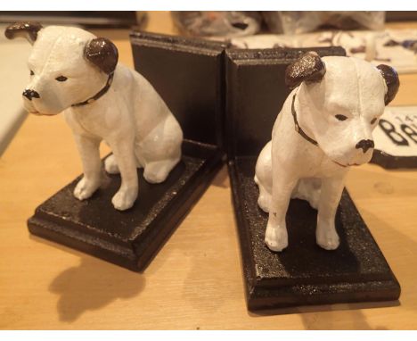 Cast Iron two sitting dog doorstoppers, H: 13 cm. P&amp;P Group 2 (£18+VAT for the first lot and £3+VAT for subsequent lots) 
