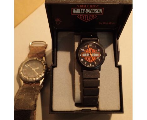 Boxed Harley Davidson wristwatch and a vintage canvas strap wristwatch. P&amp;P Group 1 (£14+VAT for the first lot and £1+VAT