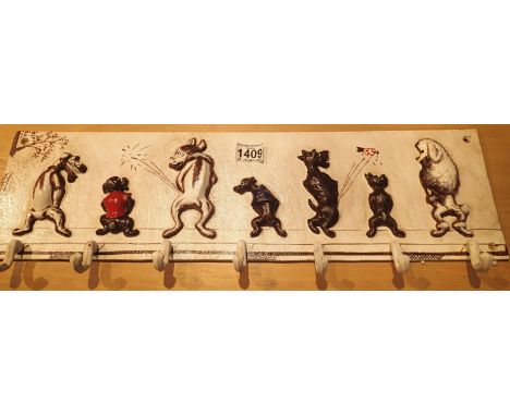 Cast iron dogs wall coat hanger rail, L: 60 cm. P&amp;P Group 2 (£18+VAT for the first lot and £3+VAT for subsequent lots) 