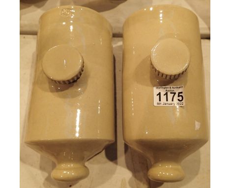 Two ceramic early 20th century hot water bottles. Not available for in-house P&amp;P, contact Paul O'Hea at Mailboxes on 0192