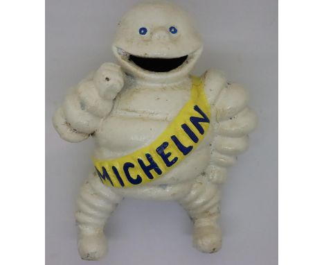 Cast iron Michelin Man moneybox, H: 16 cm. P&amp;P Group 1 (£14+VAT for the first lot and £1+VAT for subsequent lots) 