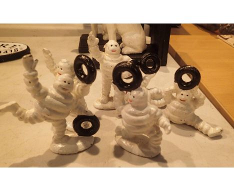 Cast iron six posing Michelin man figurines, H: 9 cm. P&amp;P Group 1 (£14+VAT for the first lot and £1+VAT for subsequent lo
