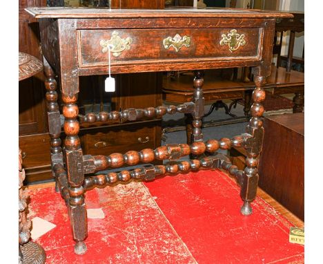 An 18th century oak bobbin turned lowboy, 78cm by 53cm by 74cm