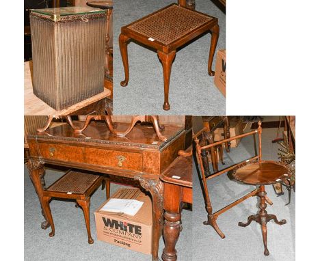 A 1920s walnut canteen table (empty), 114cm by 57cm by 87cm, together with a caned stool and a Lloyd loom style linen basket,
