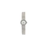 BAUME & MERCIER IN WHITE GOLD AND DIAMONDS - From 1955