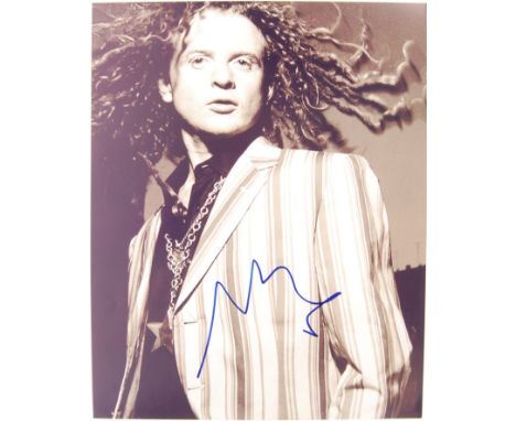 Mick Hucknall - English Singer / Songwriter - Simply Red - autographed 8x10" black and white photograph. Signed in blue marke