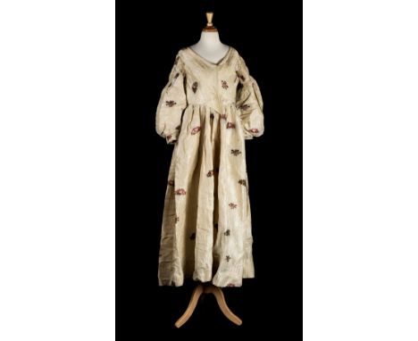 * Dress. A brocade gown of mid to late 18th century Spitalfields silk, circa 1835-1840, hand-sewn dress of silk brocade, with