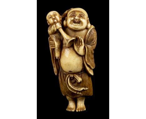 * Netsuke. A fine Japanese Meiji period ivory netsuke, carved as a man carrying a child blowing a horn, signed, 8cm high (Qty