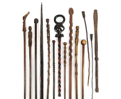 * Staffs. A collection of African staffs including Zulu, including a knobkerrie with spherical head and long shaft, 67cm long