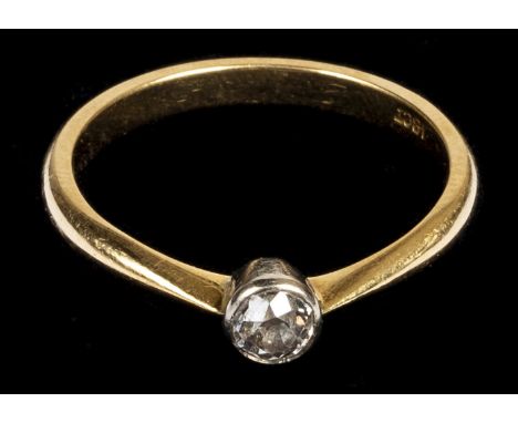 * Ring. An 18ct gold diamond solitaire ring, the brilliant cut stone approximately 0.25 carat with inclusions, stamped 18ct, 