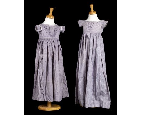 * Children's Clothes. A Regency girls' dress, circa 1810, hand-stitched sprigged cotton dress for a young girl, with fine pal