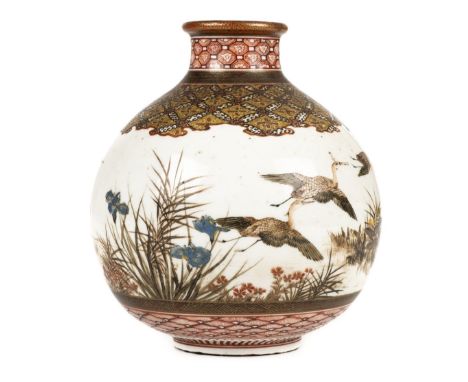 * Vase. A Japanese porcelain vase, Meiji period (1868-1912), of ovoid form finely decorated with crane in flight, within mult