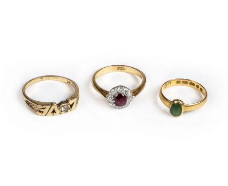 * Rings. A 22ct gold ring set with a green stone cabochon, stamped '22ct', size K, together with an 18ct gold ruby and diamon