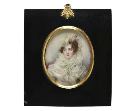 * Miniature. Portrait of a Young Lady, circa 1830s, watercolour and bodycolour on ivory, laid down on leather, oval half-leng