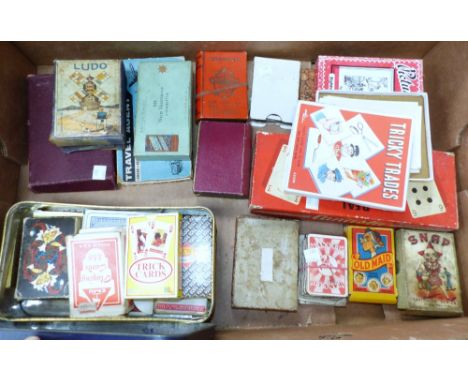 A selection of vintage packs of cards, and card games
