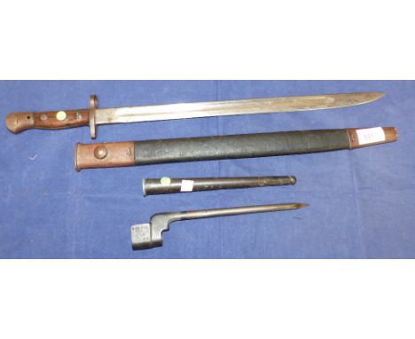 A WWI bayonet with scabbard, overall length 23"; a WWII stiletto bayonet, length 10"