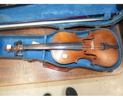 A 3/4 size violin with bow and case