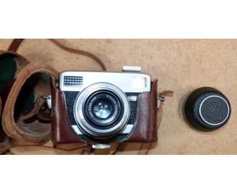 A Werra camera with rotating wind shutter/advance, integral lens cover/lens hood, leather E.R. case