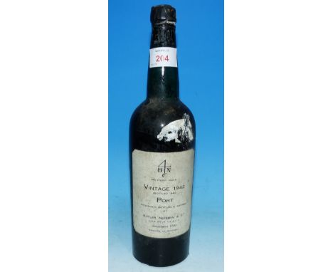 A 1942 Butler & Nephew bottle of vintage port (seal chipped but intact, level upper shoulder)