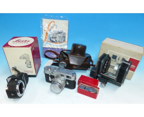 A Leica M3 camera Serial No 1027200, with Elmar f/4 90 mm lens, leather ER case together with couple meter, Visoflex III boxe