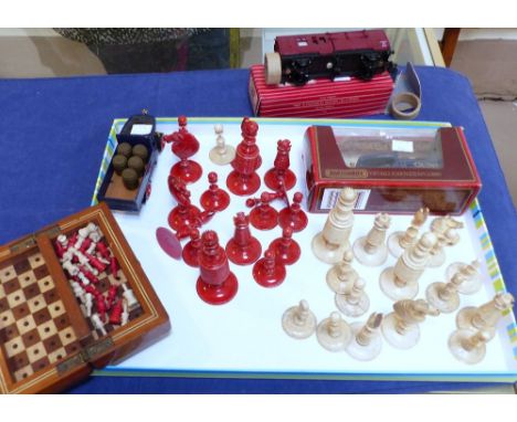 An early 20th century red and white turned bone chess set; a travelling chess set; a boxed Hornby Dublo carriage and 2 diecas
