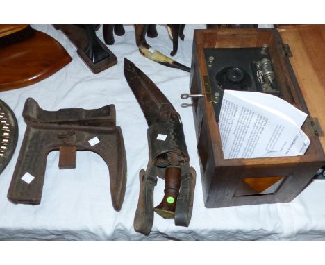 A vintage crystal set in oak case; a shoe last; and a kukri 