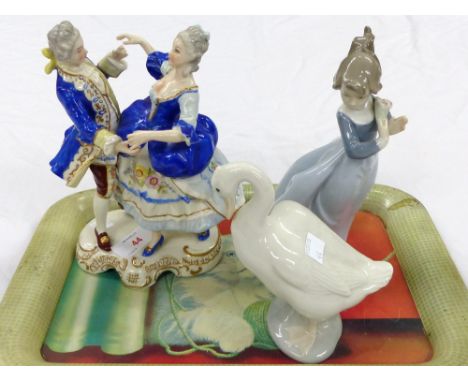 A Meissen style group depicting an 18th century couple dancing, height 8½"; 2 Nao figures