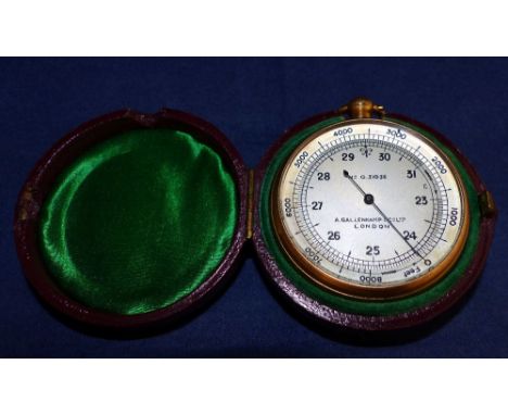 An early 20th century pocket aneroid barometer by A Gallenkamp & Co Ltd, London, in red morocco case