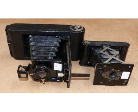 An Eastman Kodak Co vest pocket folding camera; and another of similar vintage