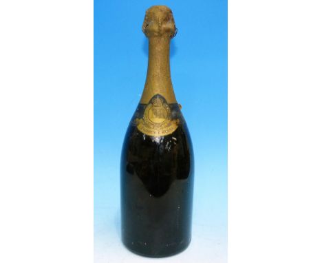 A bottle of Moët & Chandon Coronation AD 1953 cuvée champagne vintage 1943 (some loss to foil and slight rip to label)