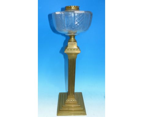 A large Victorian square column brass oil lamp on stepped base, with cut glass reservoir