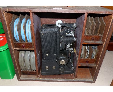 A Specto vintage cine projector with film reel, etc., in fitted wooden box