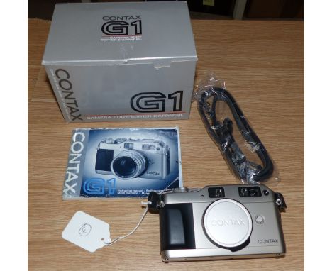 A Contax G1 camera body Serial No 020807 (includes instruction manual