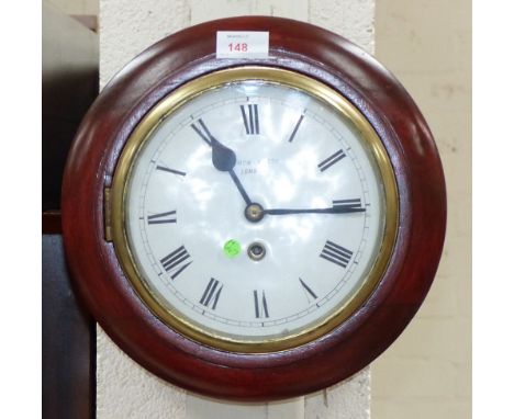 A circular 8 day fusee wall clock