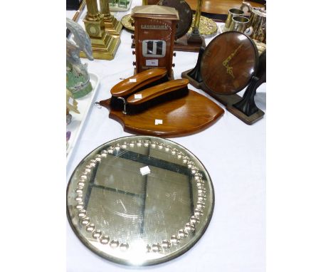 An Edwardian perpetual calendar; a brush rack; a walnut mantel clock; a mirrored stand