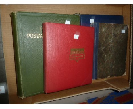 An Ideal Printed Album with a collection of world stamps; 3 other vintage albums