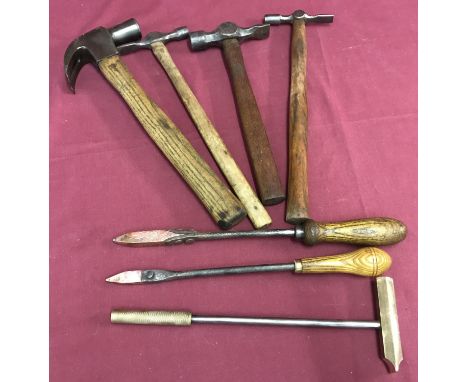 A small quantity of vintage wooden handled tools.  Comprising: 4 hammers, 2 soldering irons and a brass anti spark hammer. 