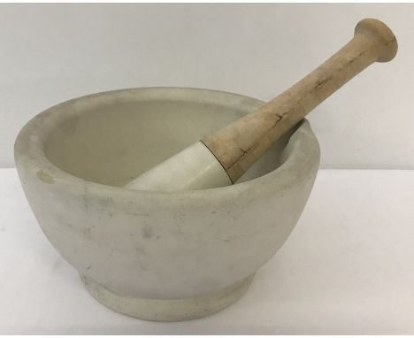 A large vintage ceramic pestle and mortar with part wooden handle.   Pestle approx. 20.5cm diameter x 11.5cm tall.