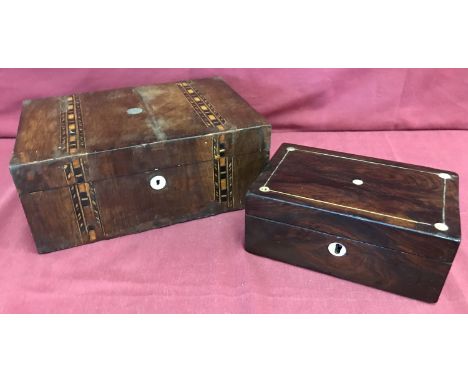 2 vintage dark wood stationary boxes with inlaid and mother of pearl detail.   Largest approx. 10.5cm x 25cm wide.