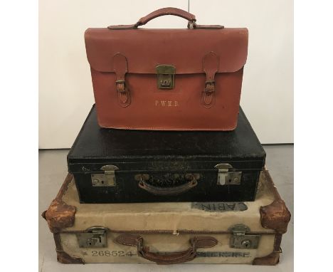 A collection of 3 vintage luggage items. Comprising a WWII canvas &amp; leather suitcase bearing original owner's details;  a