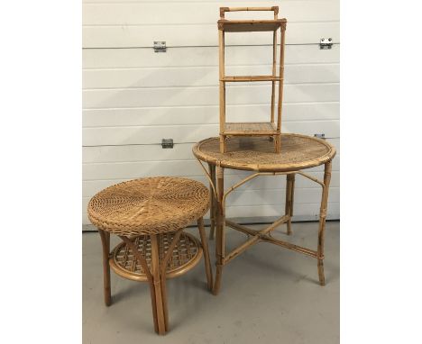 3 modern cane furniture items.  Comprising: 2 circular side tables together with a 3 tier shelf unit.  Largest table approx. 