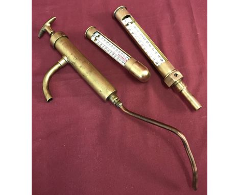 2 vintage steam related brass temperature gauges together with a brass hand pump.  