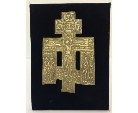 A vintage Russian brass religious plaque mounted on a velvet covered wooden stand.   Approx. 30cm x 23cm.