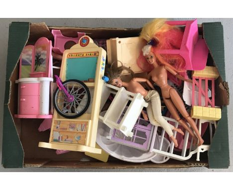 A box of 1990's Barbie dolls and accessories.  