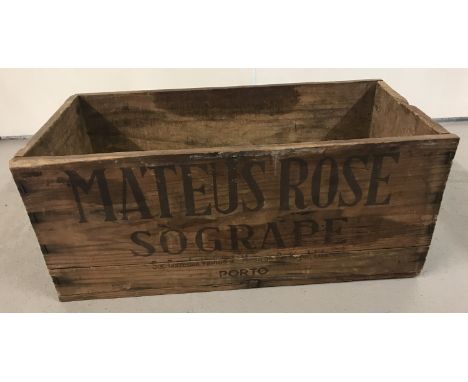 A vintage wooden Mateus Rose advertising crate.   Approx. 23cm tall x 53cm long.