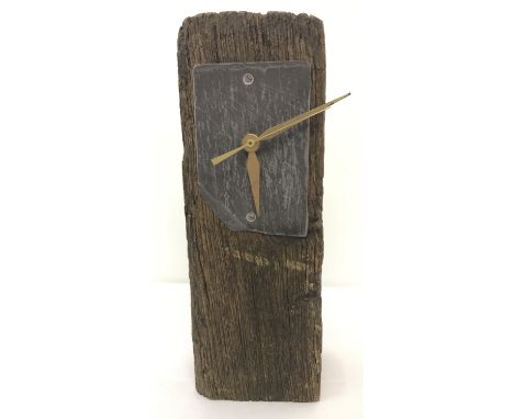 A slate and sleeper wood clock with hours, minutes and seconds hands.   Approx. 30.5cm tall.