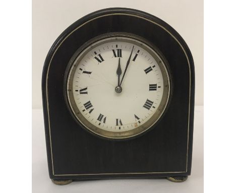 A late 19th/early 20th century rosewood cased mantel clock. With an 8-day movement. Clock face is clear white enamel with Rom