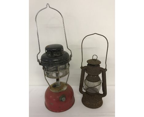 A vintage Tilley lamp together with a hurricane lamp.   Largest approx. 33cm tall without handle.