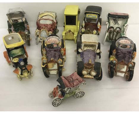 A collection of 10 ornamental ceramic vintage car figurines.  In an assortment of colours, makes and sizes. 